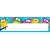 A colorful owl themed name plate with an image of owls.