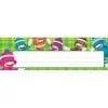 A monkey themed name plate with green plaid background.