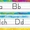 A rainbow themed alphabet strip with the letters of the alphabet.