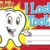 A tooth with a sign on it that says " i lost my tooth ".
