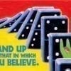 A poster of dominoes with the words stand up and believe.