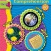 A book cover with three circles and the words " grade 4 comprehension ".