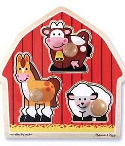 A wooden barn with animals on it