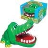 A green alligator toy with its mouth open.