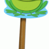 A green frog on top of a stick.
