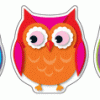 A group of three owls with different colors.