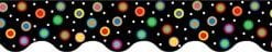 A black background with colorful circles in the middle.