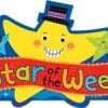 A star of the week sign with stars and a hat on it.