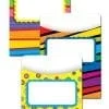 A set of three colorful file folders with different designs.