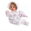 A baby doll wearing pink and white pajamas.