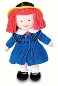 A doll with red hair and blue dress