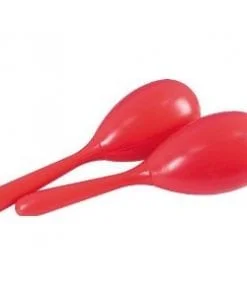 A pair of red spoons are sitting on top of each other.