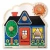 A wooden puzzle with three pieces of different shapes.