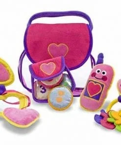 A pink and purple Pretty Purse Fill and Spill Toddler Toy bag with a heart shaped (Pretty Purse Fill and Spill) toy inside.