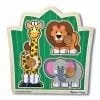 A wooden puzzle with three different animals on it.