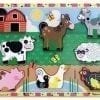 A Chunky Puzzle: Farm board with farm animals on it.