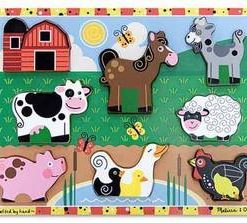 A Chunky Puzzle: Farm board with farm animals on it.