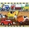 A picture of some trucks and construction equipment.