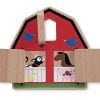 A Peek-a-Boo Barn Baby and Toddler Toy with animals and birds on it.