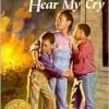 A picture of three children in front of a fire.