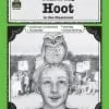 A book cover with an owl on top of the head.