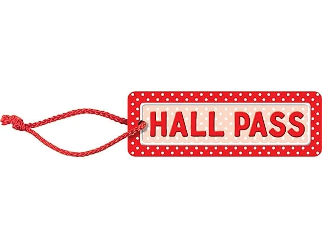 A red and white polka dot hang tag with the word " hall pass ".