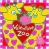 A giraffe with a heart shaped face and two hearts on it's back.